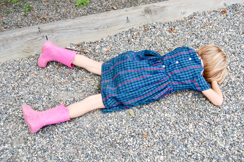 Sad girl lying on the ground