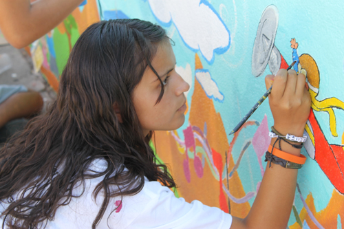 KidWorks girl painting mural