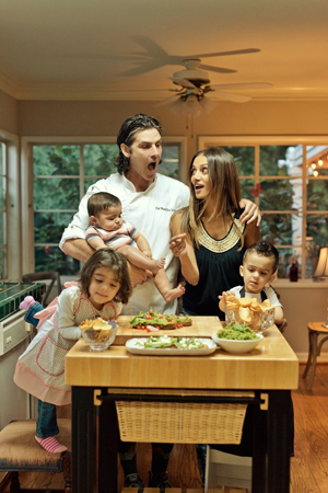Chef Max Sc dinnerhlutz and his family eating