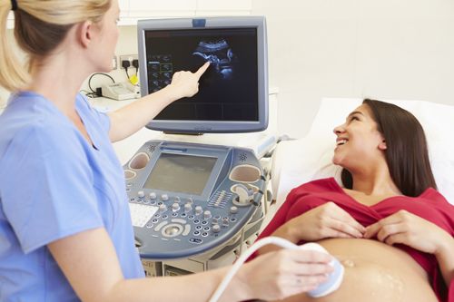 Pregnant Woman Having Ultrasound Scan