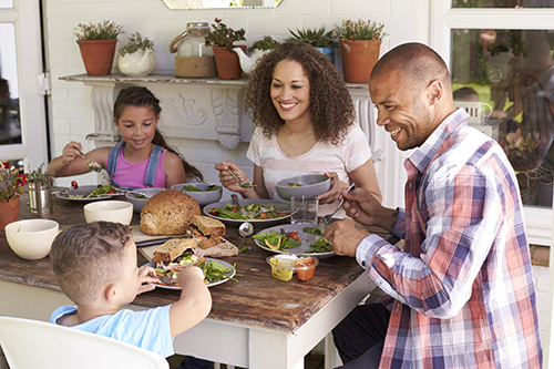 family eating healthy meal together