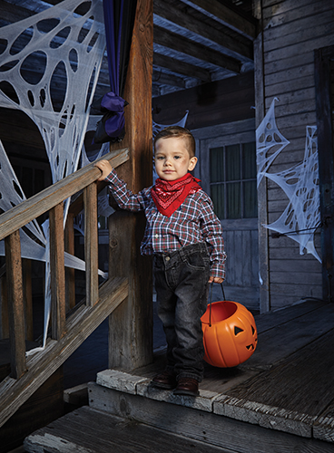 Miles Camarillo dressed up as a cowboy at Knott's Berry Farm