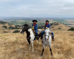 Michele Montoya and her daughter 10-year-old Megan, riding at Alisal Guest Ranch