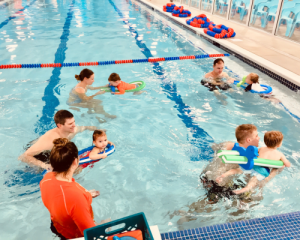 Children swimming with inflatables at GoldfishSwim School Best Swim Class