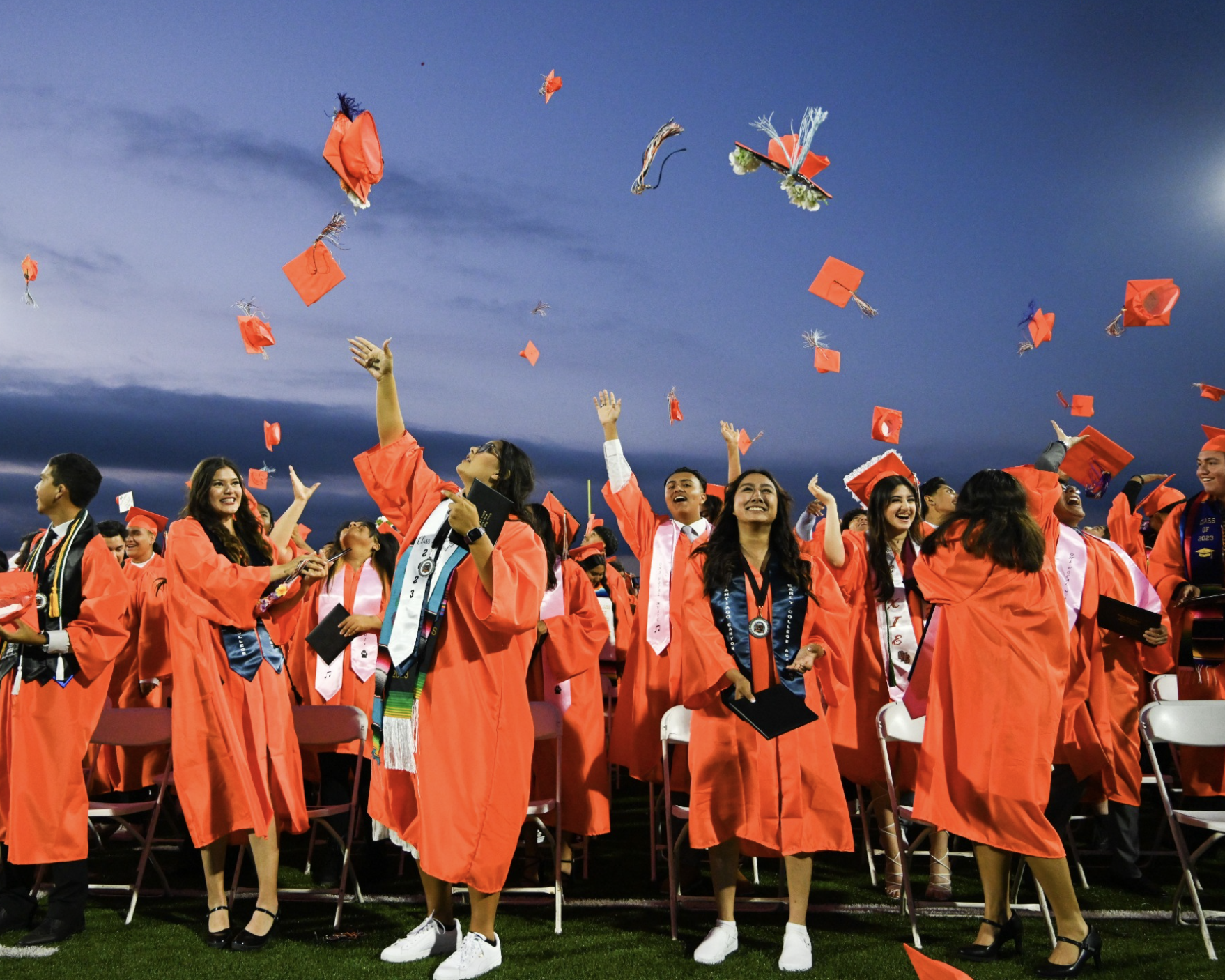 Class of 2023 throwing up their graduation hats at Orange Unified School District Best North OC School District