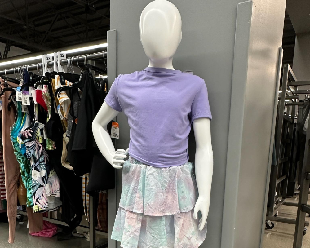 An Ariel costume with a purple shirt and tie-dye skirt 